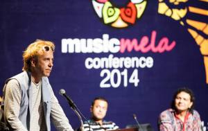 Todd Puckhaber, of SXSW Music Festival addresses Music Mela attendees.