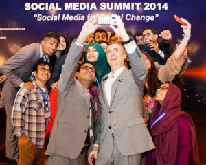 U.S Ambassador to Pakistan Richard Olson taking his first selfie with IVLP Alumnus Abdullah Dayo at the Social Media Summit
