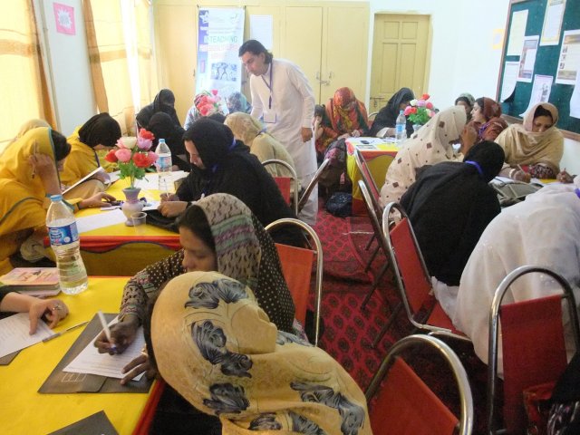 Alumnus Nazeer Ahmed oversees a brainstorming session during E-Teacher Professional Development Workshop for female teachers from May 5th to 10th, 2014.