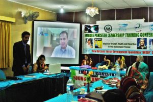 Participants from Emerge Pakistan listening to a Skype conversation with Newton Gaskill, a Diplomat at U.S Consulate General Karachi