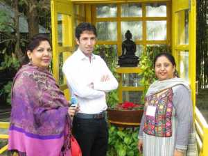 (From Left to Right) Shehnaz Akbar- participant from non-profit sector in Pakistan, UGrad Alumnus Farmanullah Mohmand and Nusrat Hashmi-participant from Pakistan pose in front of a statue of the Buddha in Nepal on Saturday, December 7, 2013.