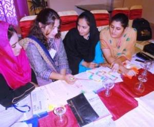 (From Left to Right) Uzma Joyia (Lecturer Islamia University of Bahawalpur), Bushra Javaid (Lecturer Women Degree College Lodhran), Tahira Asghar (Lecturer Islamia University of Bahawalpur) and Naima Khan (Visiting Lecturer Islamia University of Bahawalpur) attend the second day of the workshop in Bahawalpur on October 12, 2013.