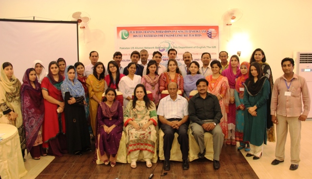 Participants of the “Teachers Technology Training Workshop” pose for a photograph at the Grand Regency Hotel in Bahawalpur on October 13, 2013.