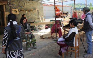 Students shooting interview with a female carpenter