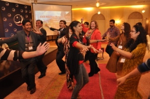 Assistant Cultural Affairs Attache Jennifer McAndrew dancing to the tunes of “Sado-e-Pomir” with CCI alumni