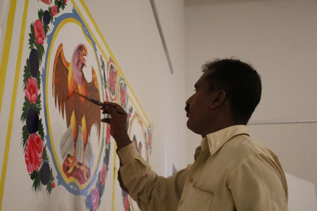 Truck artist creating his magic at Natasha Jozi’s exhibition 