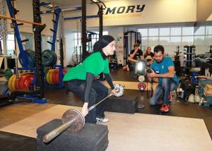 Shehzad Hameed filming Pakistani American weight-lifter Kulsoom Abdullah 