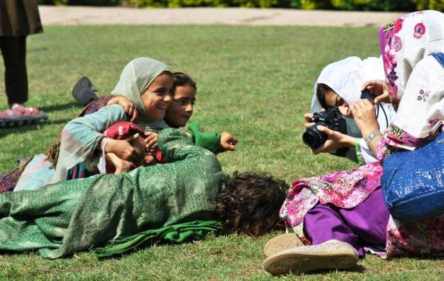 Female Participants taking photographs during the Nat-Geo Photo Camps